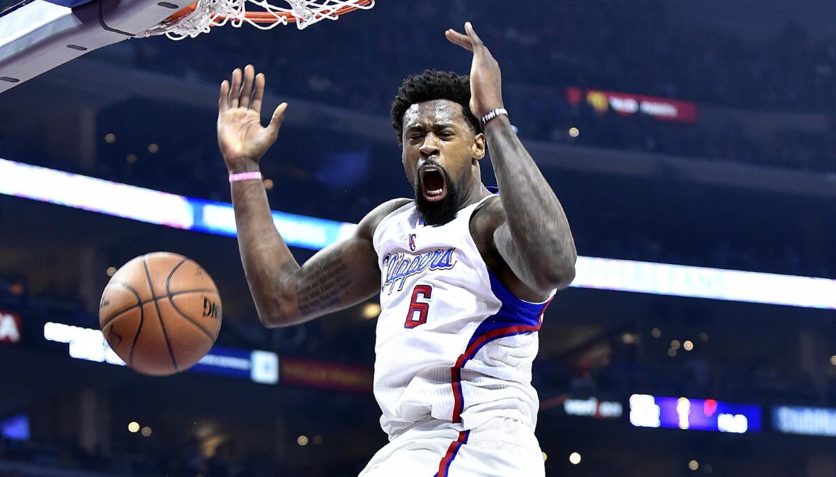 Clippers center DeAndre Jordan reacts after dunking against the Rockets in the first half of Game 6.