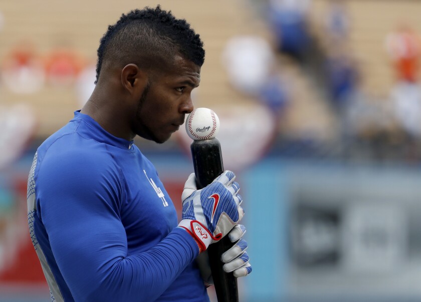 Yasiel Puig takes in batting practice before Game 6 of the World Series against the Houston Astros at Dodger Stadium.