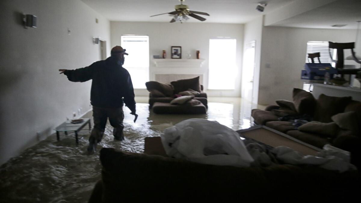 This home in the Houston suburb of Clodine was flooded by the rains from Hurricane Harvey. Only a fraction of Houston-area homeowners are insured against flood damage.