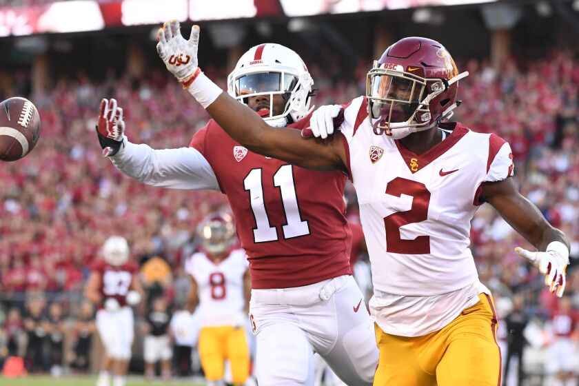 USC receiver Devon Williams can't make the catch as Stanford cornerback Paulson Adebo defends in the 2nd quarter.