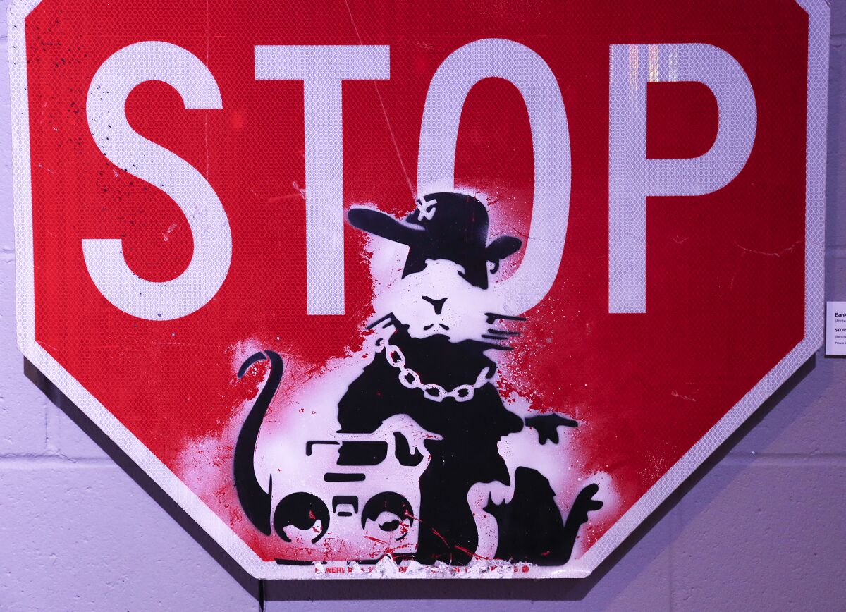 "Stop Rat" a popular piece by the artist Banksy at the "Banksyland" exhibit.