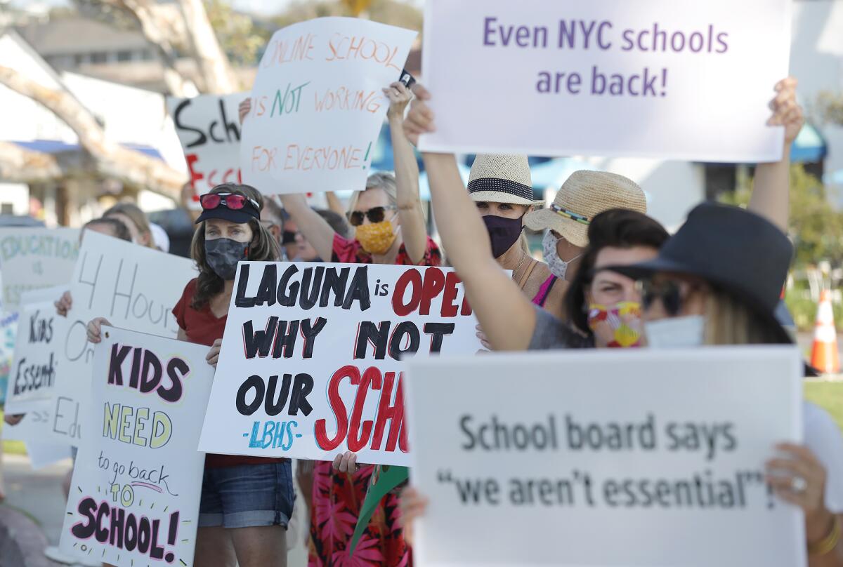 Laguna Beach parents demonstrate to open Thurston Middle School, Laguna Beach High School.
