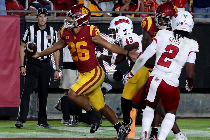 USC running back Travis Dye scores a touchdown against Fresno State Saturday night
