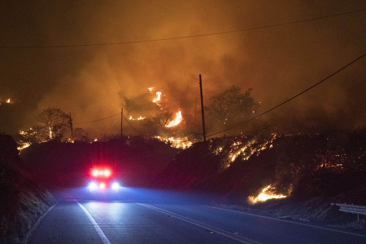 A brushfire burns along Highway 1 near Big Sur on Friday.