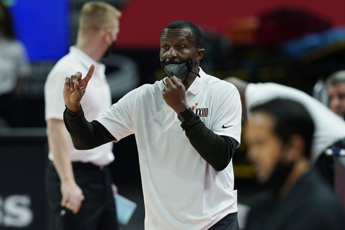 Detroit Pistons head coach Dwane Casey directs from the sideline during the first half of an NBA basketball game against the Miami Heat, Sunday, May 16, 2021, in Detroit. (AP Photo/Carlos Osorio)