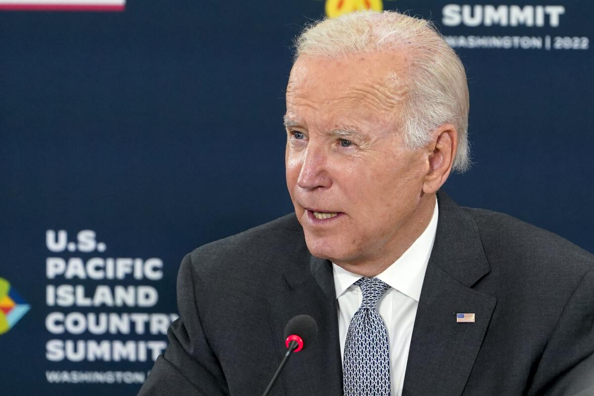 A head and shoulder shot of President Biden speaking during a summit