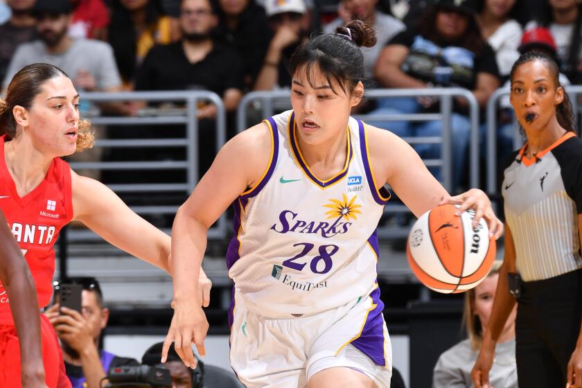 Sparks center Li Yueru drives to the basket during the game against Atlanta on Sept. 1, 2024.