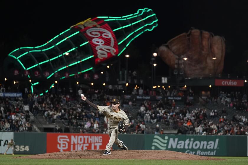 San Diego Padres pitcher Seth Lugo works against the San Francisco Giants during the eighth inning of a baseball game in San Francisco, Tuesday, Sept. 26, 2023. (AP Photo/Jeff Chiu)