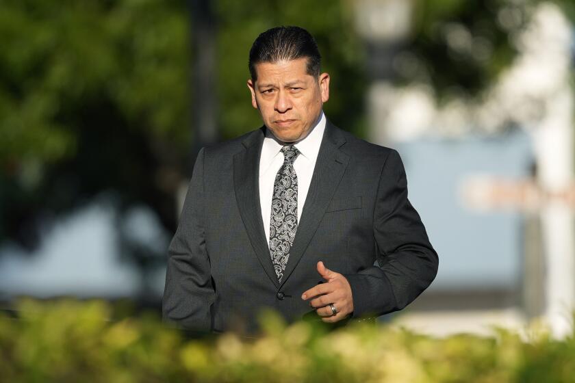 Former Uvalde Consolidated Independent School District police officer Adrian Gonzales arrives at the Uvalde County Courthouse, Thursday, July 25, 2024, in Uvalde, Texas. Gonzales made his first court appearance on charges of abandoning and failing to protect children. (AP Photo/Eric Gay)