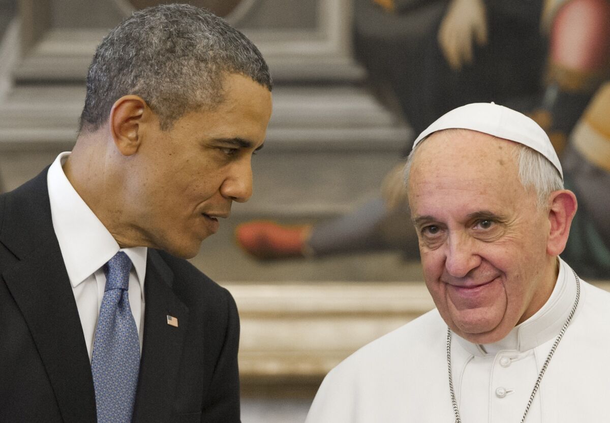 Pope Francis speaks with President Obama during a private audience on March 27 at the Vatican.