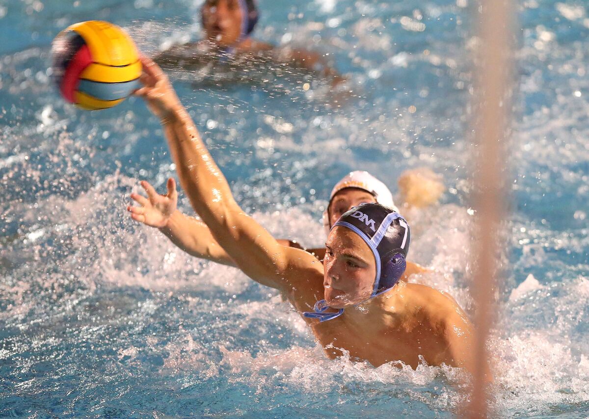 Corona del Mar's Tanner Pulice shoots and scores against Foothill in the quarterfinals of the CIF Southern Section Division 2 playoffs on Nov. 9 in Newport Beach.