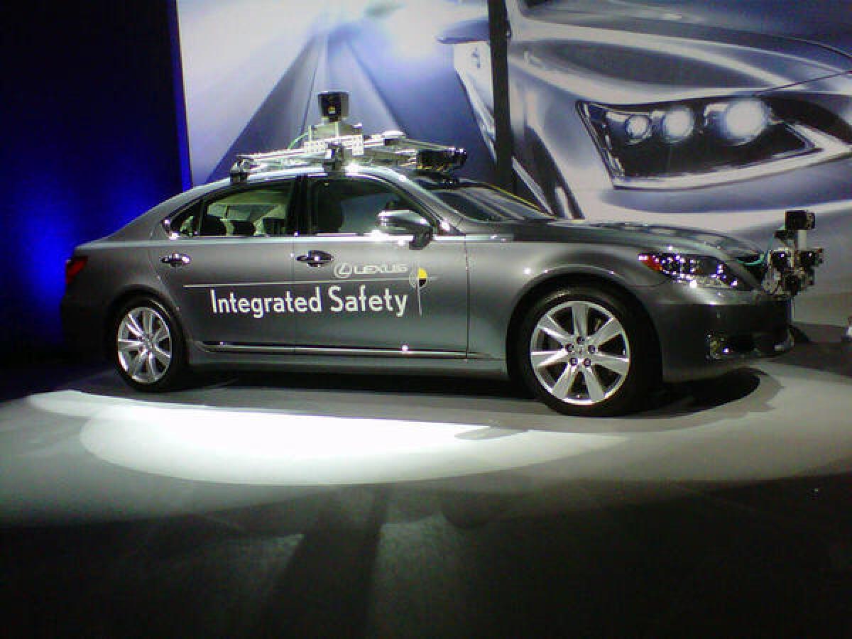Lexus shows off its driverless car concept at CES 2013.
