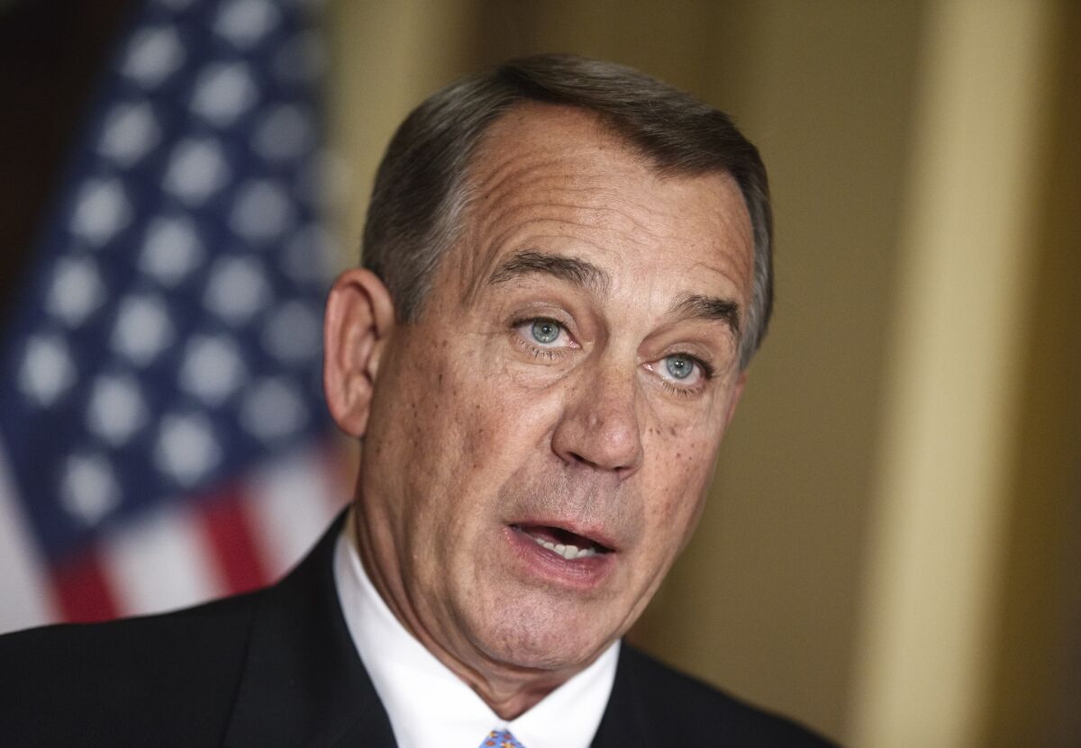 House Speaker John Boehner of Ohio speaks to reporters in Washington on Friday.