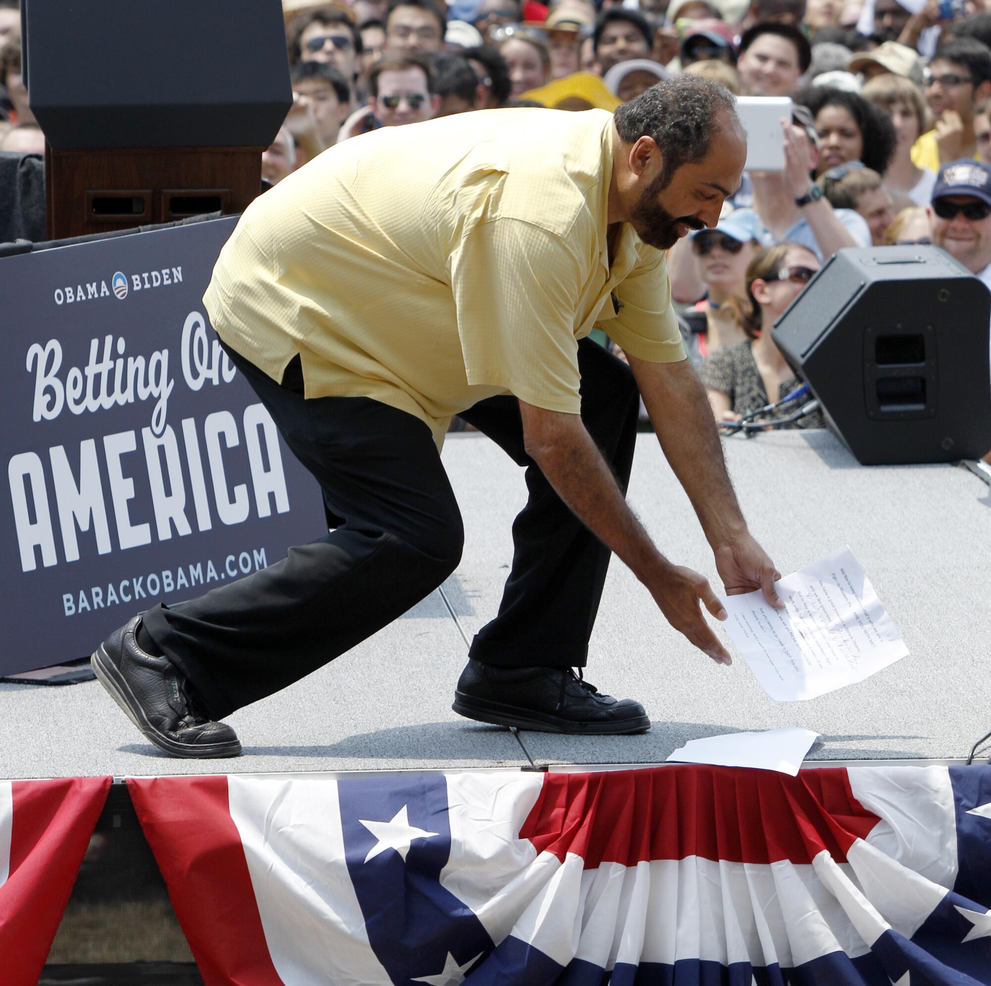 Hall of Fame running back Franco Harris poses in his famous "Immaculate Reception" catch position.