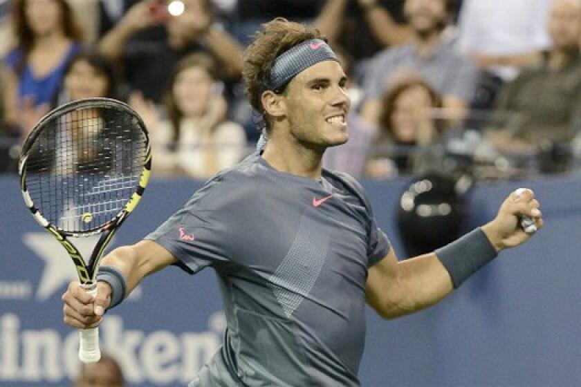 Rafael Nadal reacts after defeating Tommy Robredo during a quarterfinals match at the U.S. Open, 6-0, 6-2, 6-2.