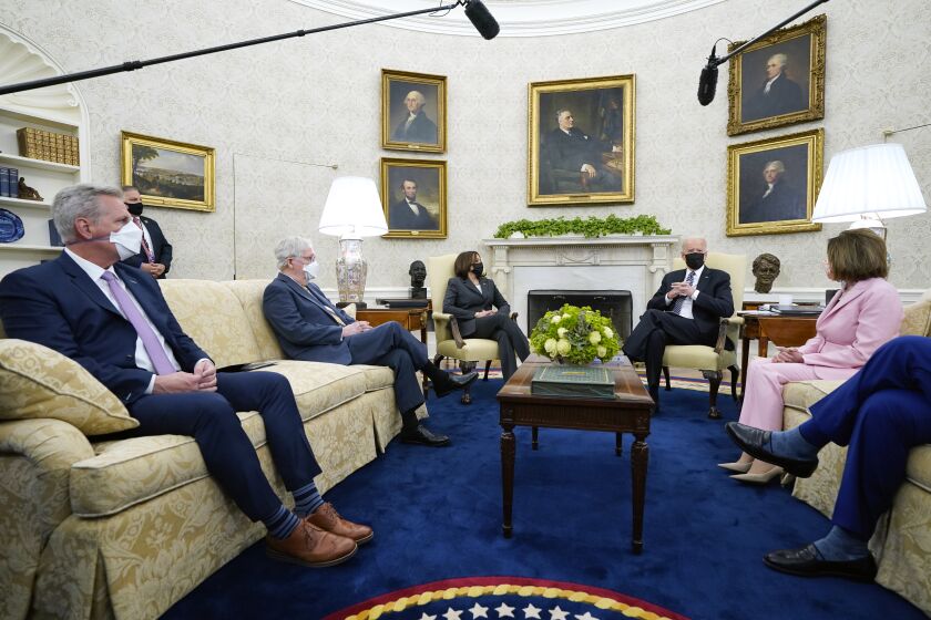 President Joe Biden speaks during a meeting with congressional leaders in the Oval Office of the White House, Wednesday, May 12, 2021, in Washington. From left, House Minority Leader Kevin McCarthy of Calif., Senate Minority Leader Mitch McConnell of Ky., Vice President Kamala, Biden, House Speaker Nancy Pelosi of Calif., and Senate Majority Leader Chuck Schumer of N.Y.. (AP Photo/Evan Vucci)