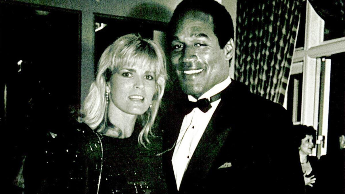 Nicole and O.J. Simpson at a benefit at the Ritz-Carlton in Dana Point in a 1989 file photo.