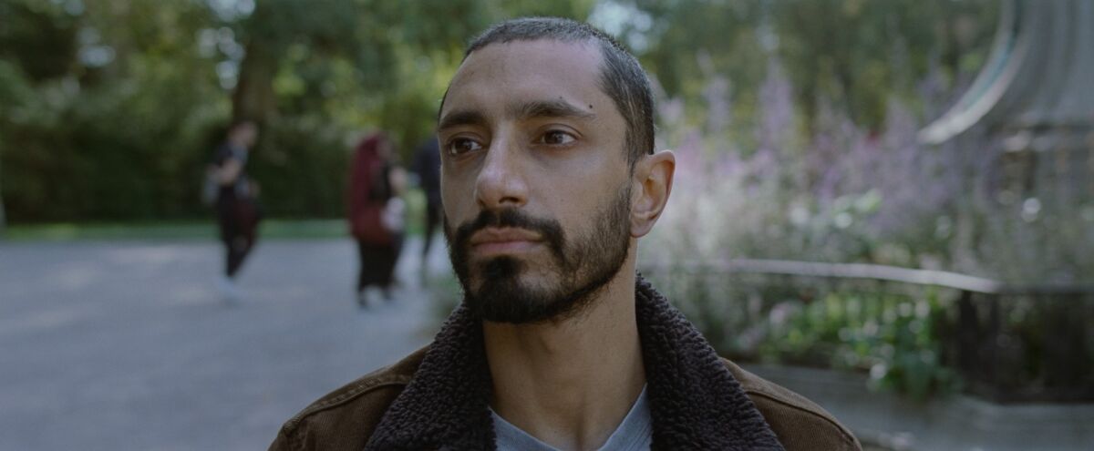 Riz Ahmed sits in silent surrender in "Sound of Metal."