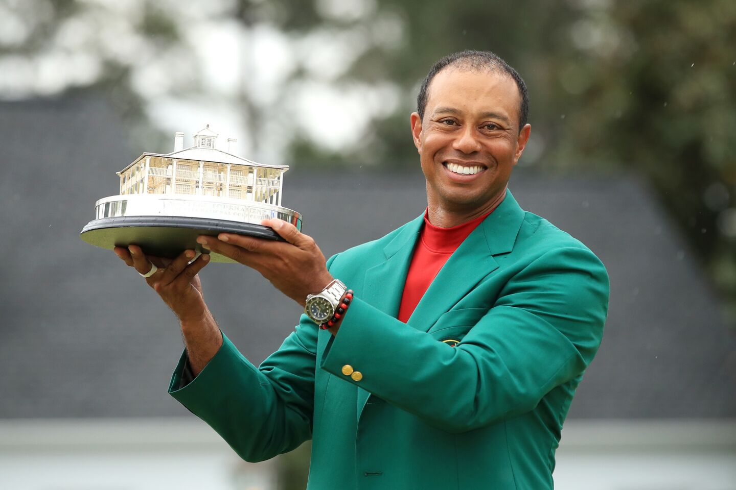 Tiger Woods celebrates after winning the Masters at Augusta National Golf Club on Sunday in Augusta, Ga.