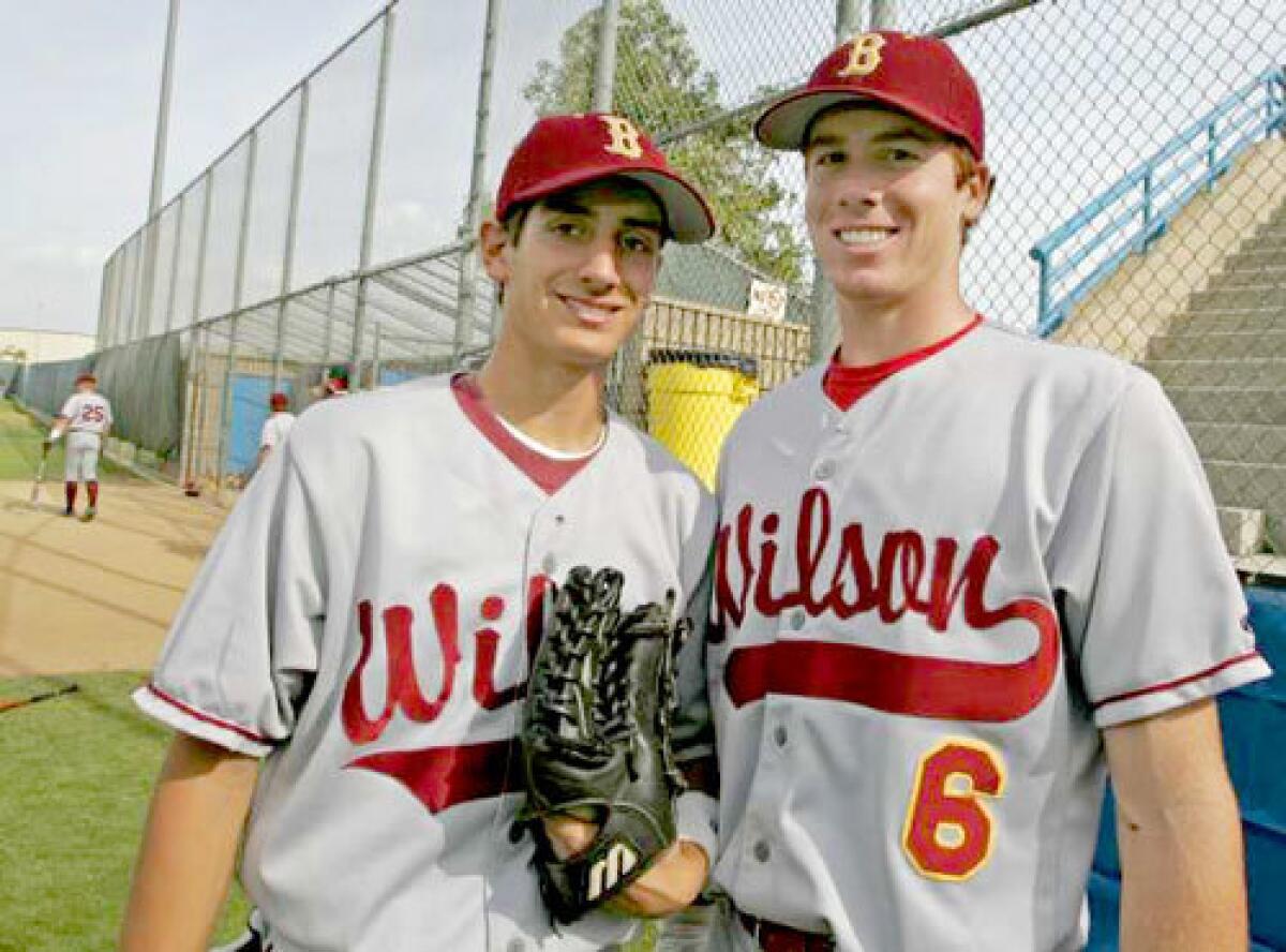 Harry Koulos, left, and Tyler Albright, who began playing youth baseball together as 8- and 9-year-olds, will try to help Wilson win the Southern Section Division I title. They have committed to Harvard and Yale, respectively.