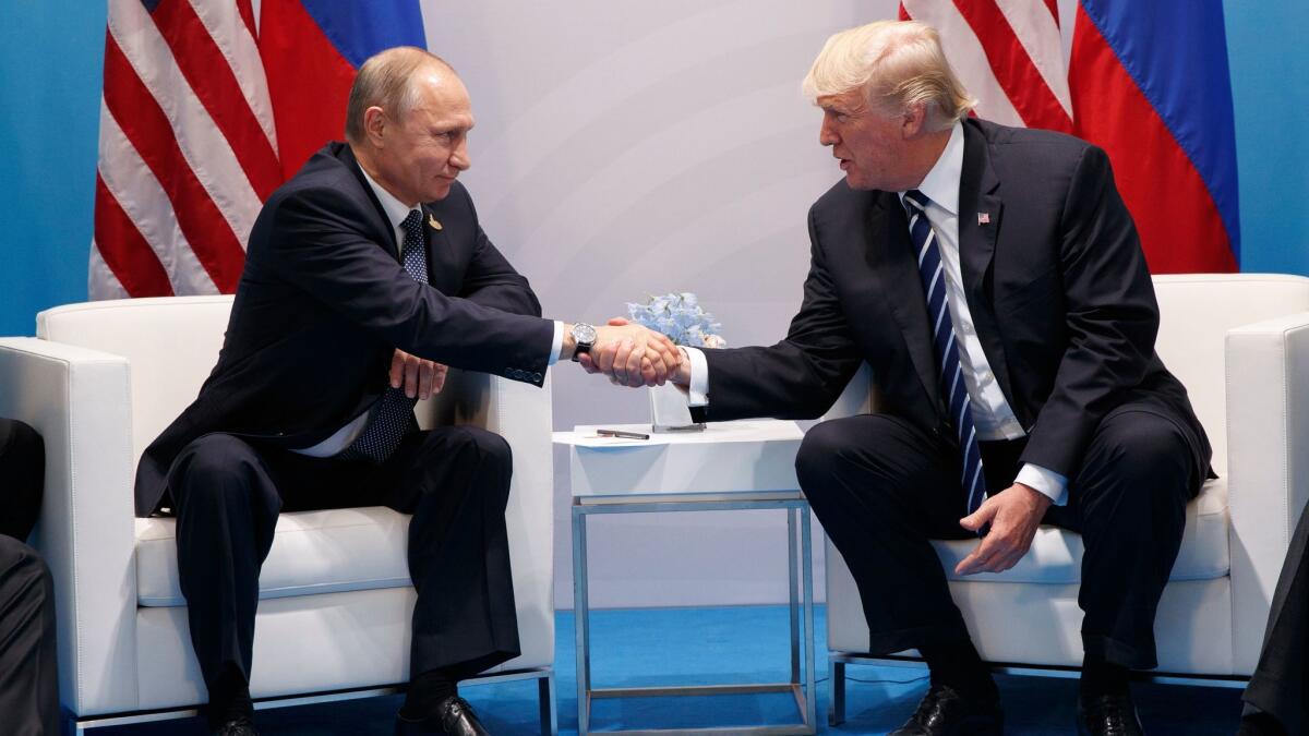 President Donald Trump shakes hands with Russian President Vladimir Putin at the G20 Summit on July 7 in Hamburg, Germany.