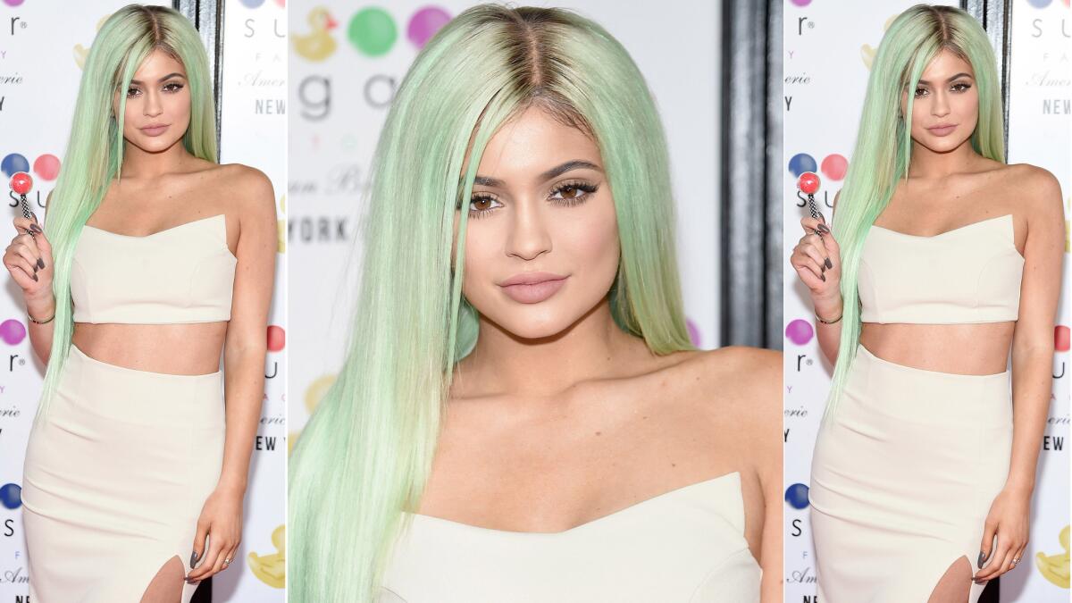 Kylie Jenner attends the opening of the Sugar Factory American Brasserie in New York City on Wednesday. Oh yeah, she has green hair now, if you didn't notice.