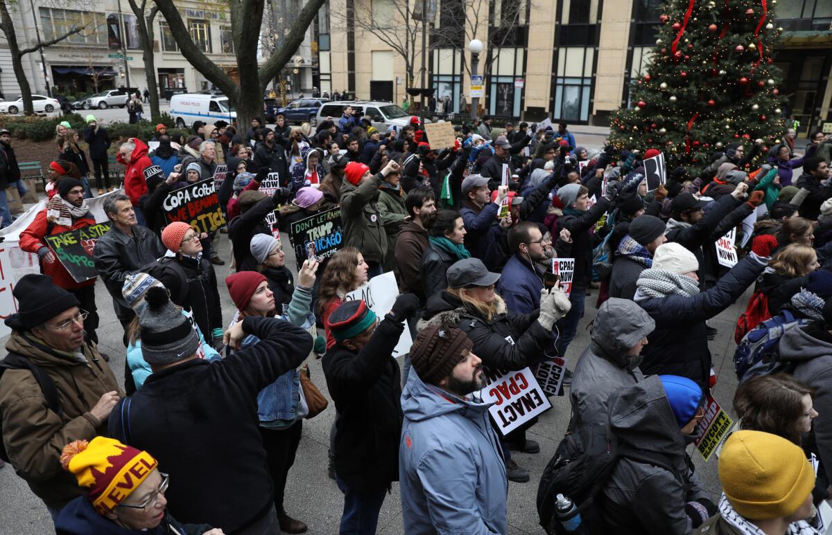 Protesters rally and call for a boycott along the Magnificent Mile, Chicago's premier shopping district, on Black Friday.