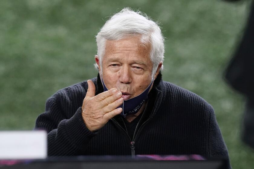 New England Patriots owner Robert Kraft blows a kiss to someone before an NFL football game against the Buffalo Bills, Monday, Dec. 28, 2020, in Foxborough, Mass. (AP Photo/Elise Amendola)