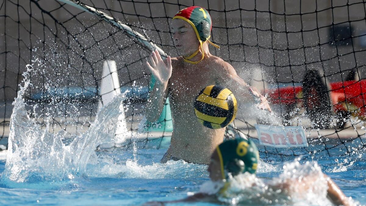 Edison High goalkeeper Caden Martin makes a first-half save against Tesoro in the first round of the CIF Southern Section Division 3 playoffs at Ocean View High on Tuesday.