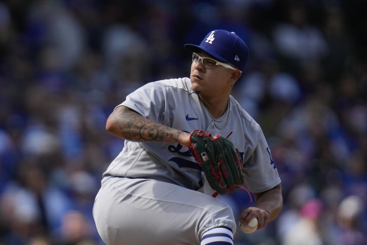 Los Angeles Dodgers starting pitcher Julio Urias throws during the third inning of a baseball game.