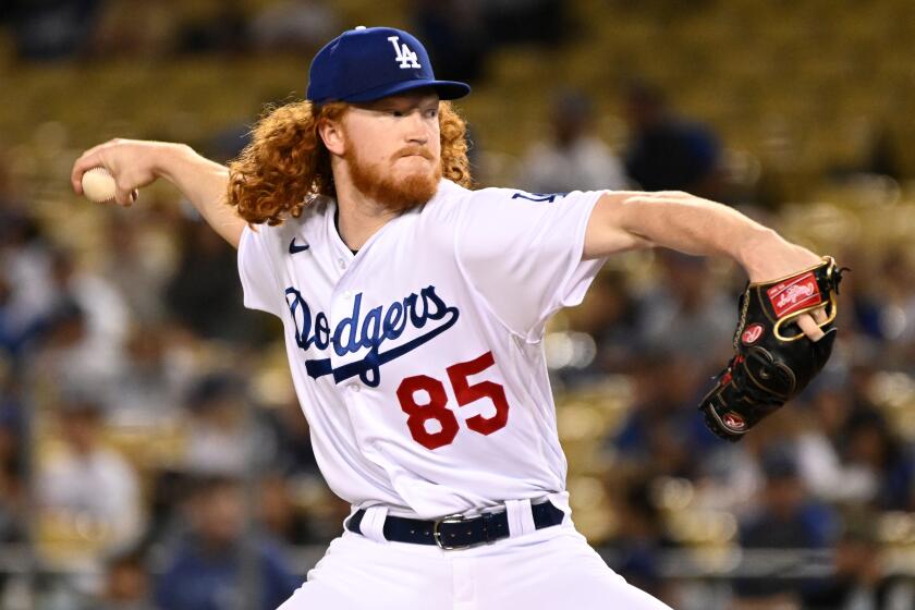 Los Angeles, California September 21, 2022-Dodgers pitcher Dustin May throws a pitch.