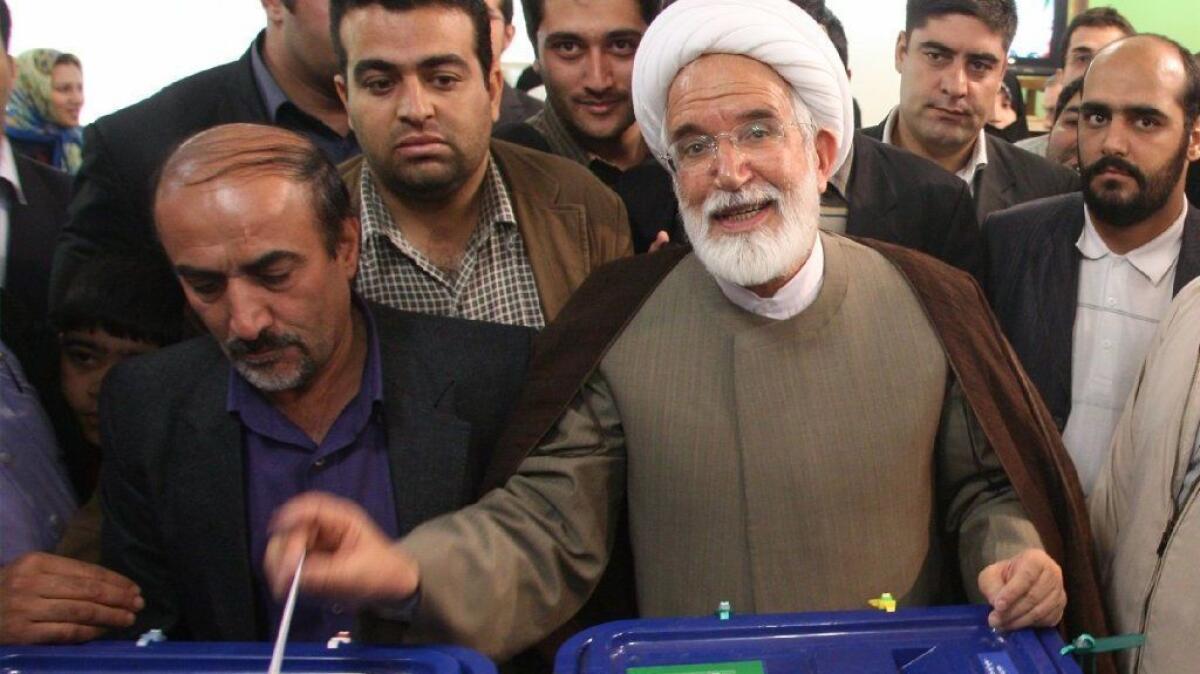 Iranian opposition leader Mehdi Karroubi casts a ballot in the 2009 election in which he ran unsuccessfully for president.