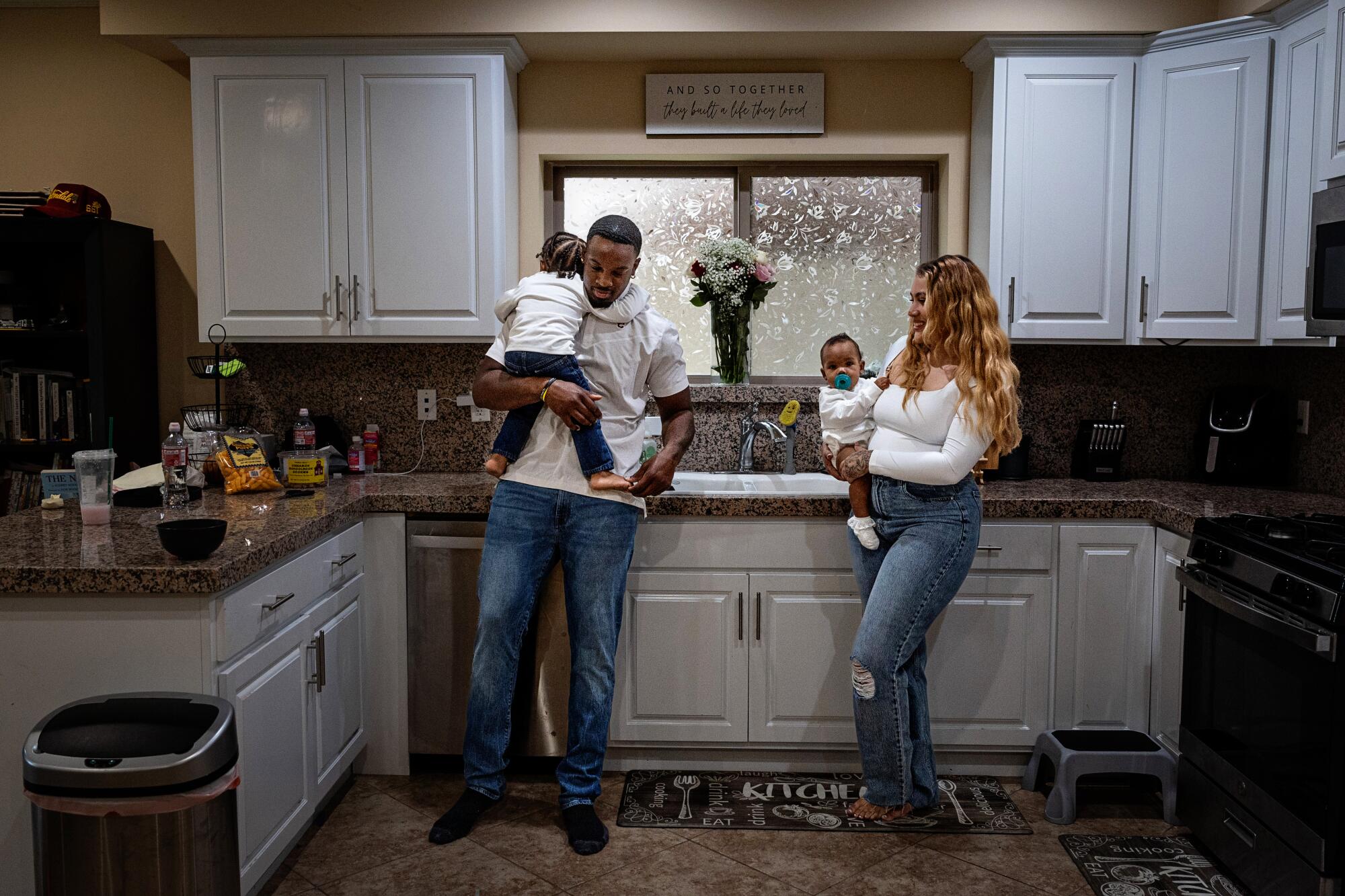 USC rush end Solomon Byrd spends an evening at home with his family.