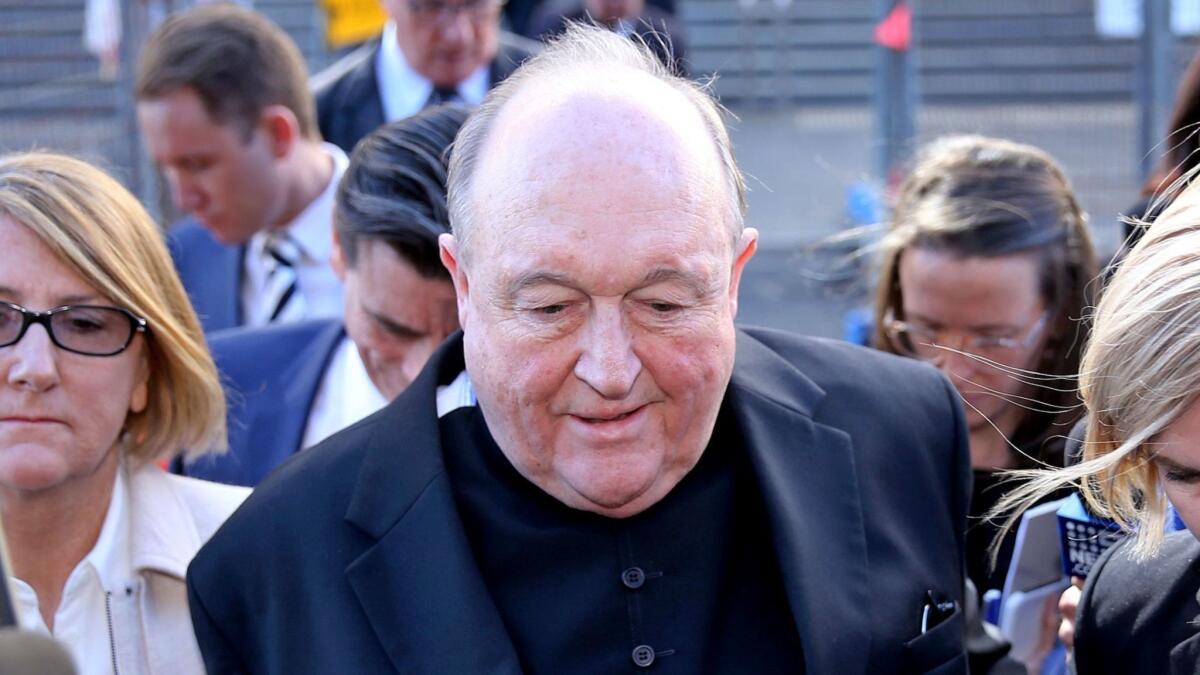 Archbishop Philip Wilson leaves the Newcastle Local Court in Newcastle, Australia, on May 22.