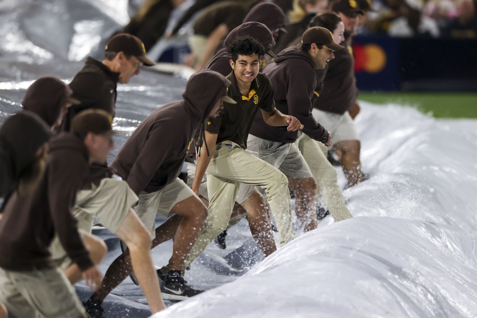 S Field crew on the field during a rain delay.