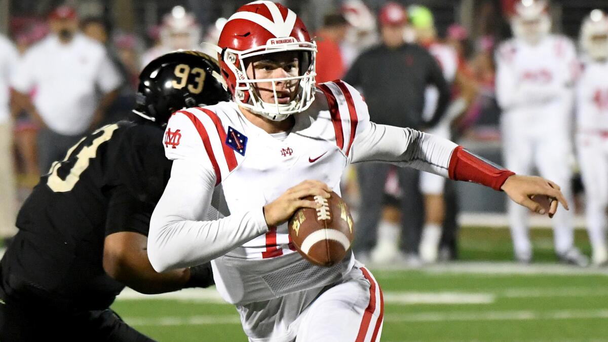 Mater Dei quarterback J.T. Daniels, showns during a game earlier this season against St. John Bosco, passed for two touchdowns and ran for two more on Friday night.