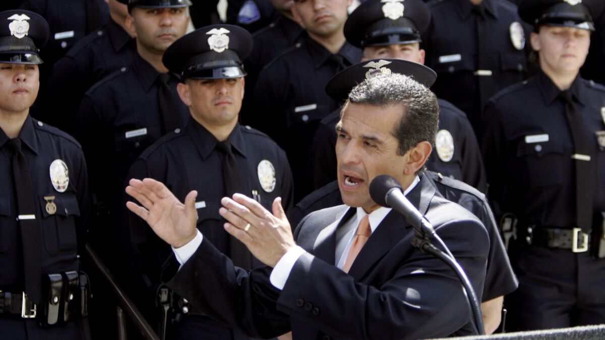 Then-Los Angeles Mayor Antonio Villaraigosa speaks in front of more than 20 LAPD cadets during a news conference about his budget plan in 2006.