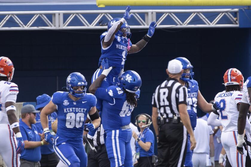 Kentucky running back Ray Davis (1) celebrates his touchdown in the endzone during the first half of an NCAA college football game against Florida in Lexington, Ky., Saturday, Sept. 30, 2023. (AP Photo/Michelle Haas Hutchins)