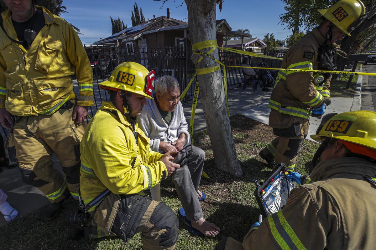 Ontario Fire Department crew treats 72-year-old David Nguyen 