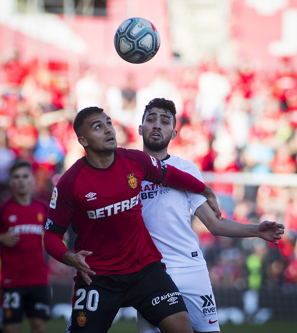 Real Mallorca defender Aleksandar Sedlar, left, vies with Sevilla forward Munir El Haddadi during a match Dec. 21.