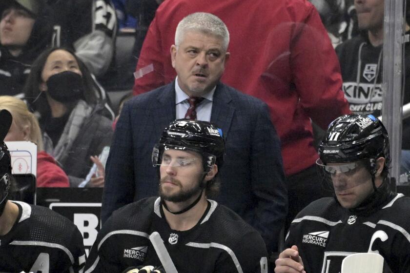 Los Angeles Kings head coach Todd McLellan looks on during the first period.