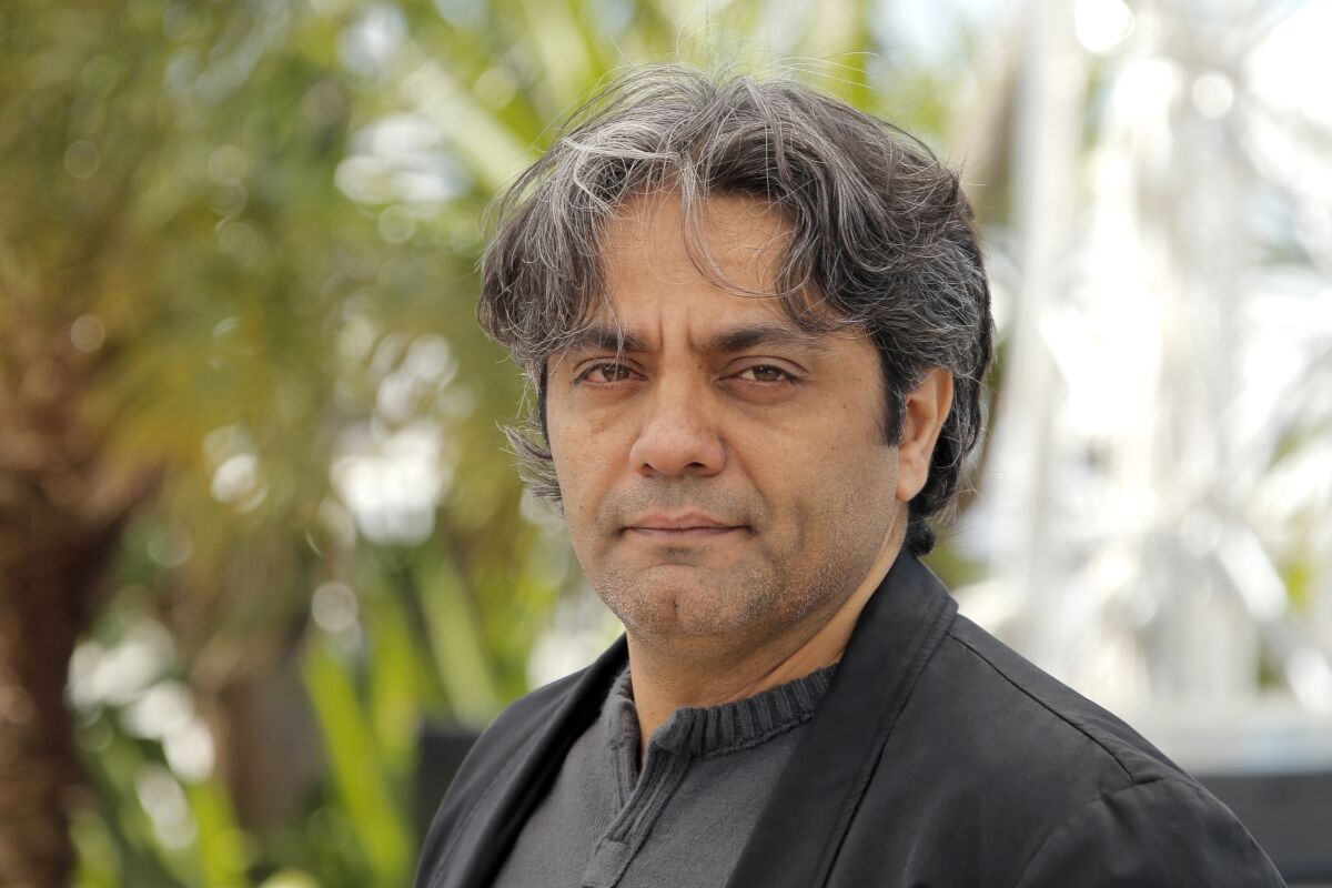 FILE - Iranian filmmaker Mohammad Rasoulof poses during a photo call for the film The Immigrant at the 66th international film festival, in Cannes, southern France on May 24, 2013. Rasoulof said in a statement signed by dozens of movie industry professionals on his Instagram account late Saturday, May 14, 2022 that security forces made some arrests and confiscated film production equipment during raids conducted in recent days. (AP Photo/Francois Mori, File)