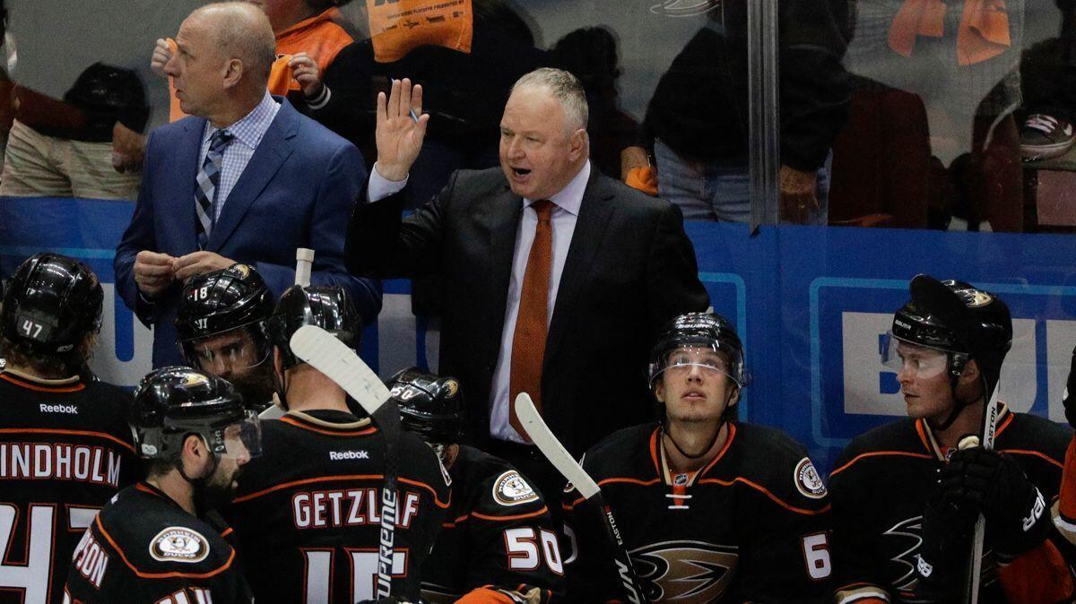 Ducks Coach Randy Carlyle talks to his players during Game 1 of their first-round playoff series against the Calgary Flames on Thursday.