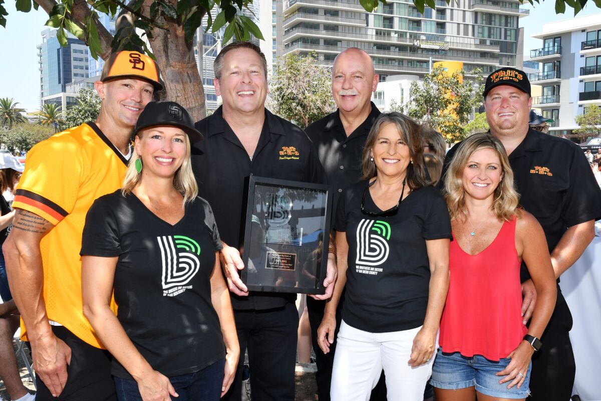 Jeff and Tina Rose (she’s BBBS-SD operations VP), Jeff Loya (Phil’s BBQ CFO), Phil Pace (Phil’s BBQ CEO; event founder), Lorie Zapf (BBBS-SD president/CEO), Kevin and Michelle Sheehan (he’s Phil’s BBQ COO; 2019 BBBS-SD Volunteer of the Year awardee)