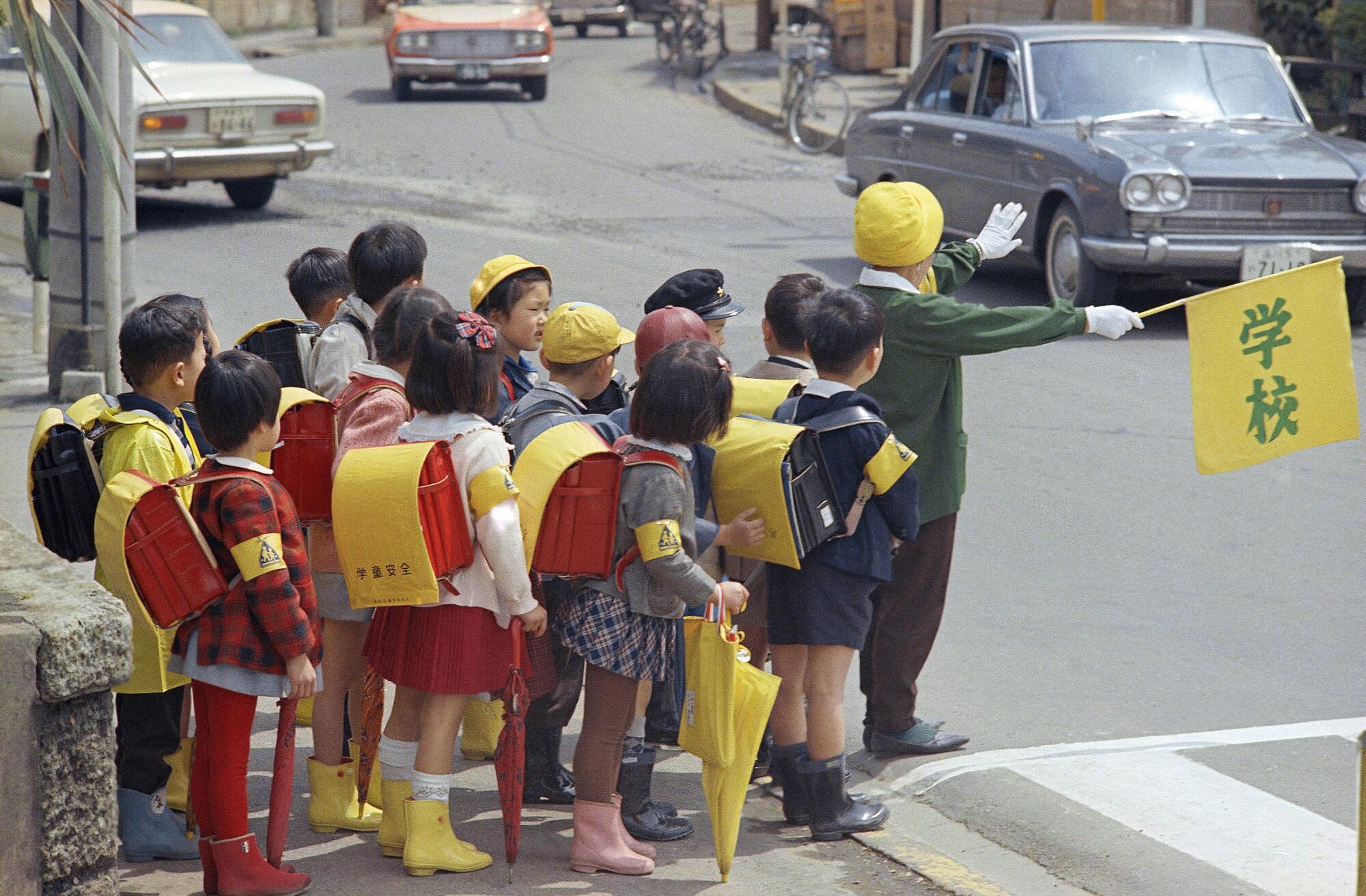 Japanese schoolchildren learning to cross the street