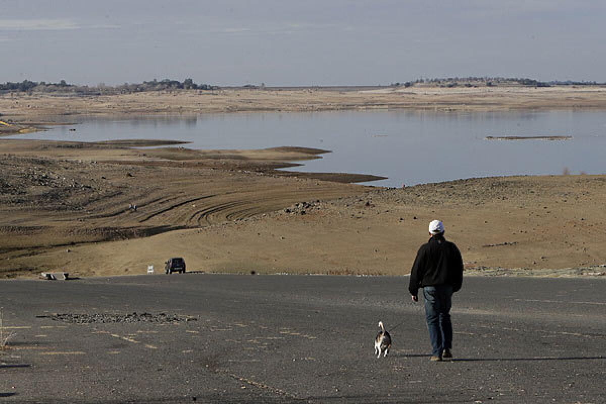 A boat ramp is now several hundred yards away from the water's edge at California's Folsom Lake.