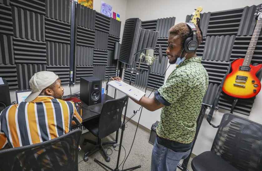 Oasis members Jahi Veasey Tre Jackson in a recording studio at the clubhouse. 