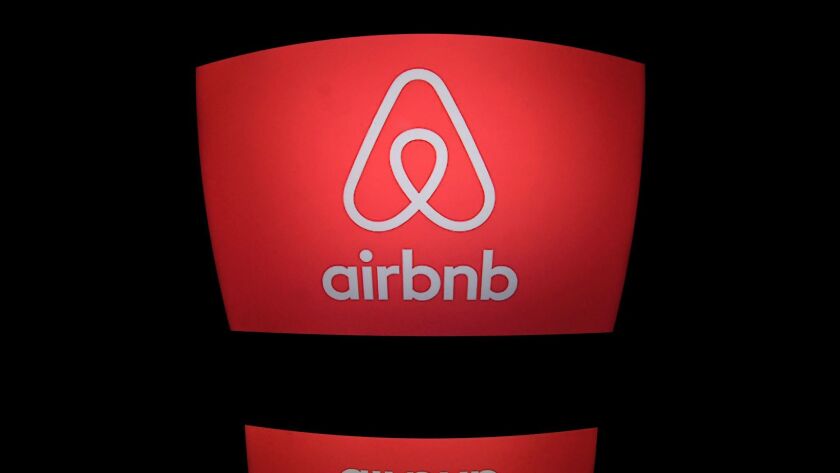 The logo of online lodging service Airbnb displayed on a computer screen on March 2.