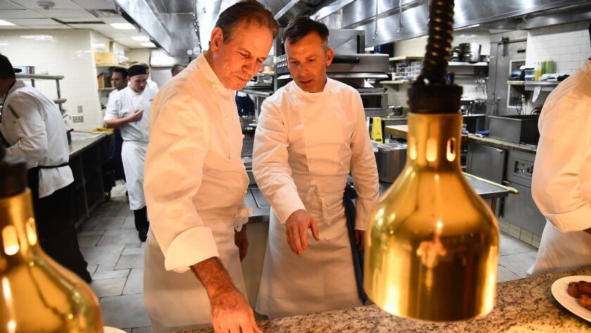Thomas Keller (left), the chef with the most Michelin stars in America, with Addison chef and protégé William Bradley at the 2017 Robb Report Culinary Masters.
