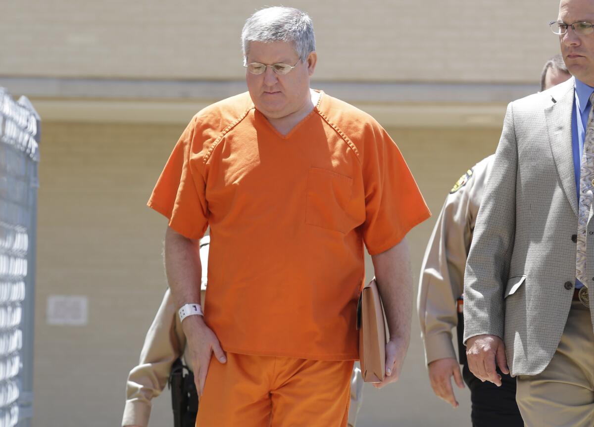 Bernie Tiede is led into the Panola County court house by law enforcement officials in Carthage, Texas.